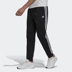 Adidas Pantalone Essentials Warm-Up Tapered 3-Stripes H46105